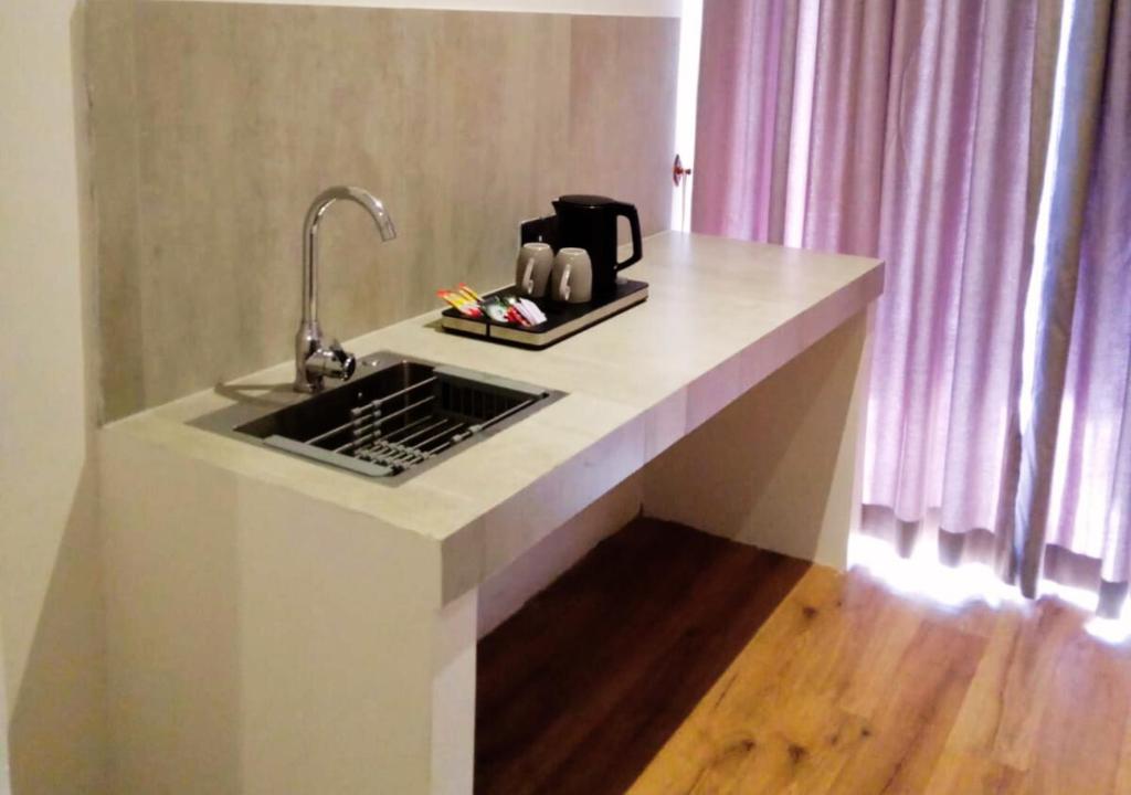 Kuchyň nebo kuchyňský kout v ubytování Diyakawa Boutique Hotel