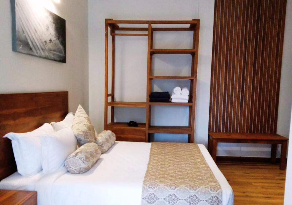 Postel nebo postele na pokoji v ubytování Diyakawa Boutique Hotel