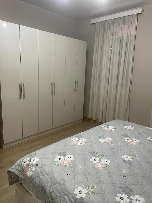Postel nebo postele na pokoji v ubytování IR Guest House