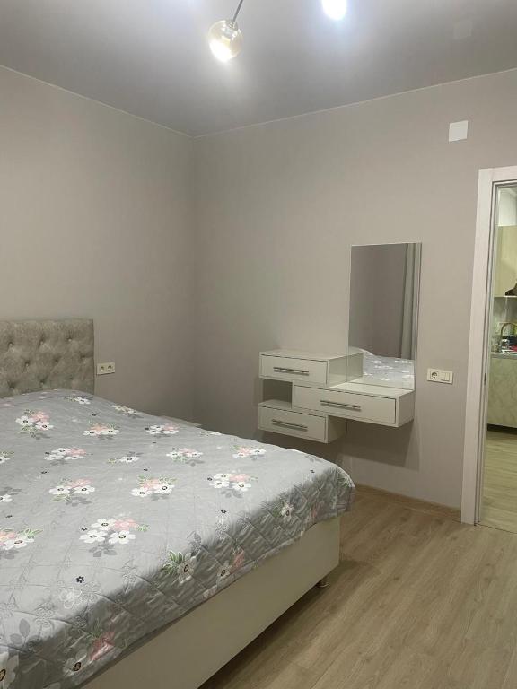 Postel nebo postele na pokoji v ubytování IR Guest House