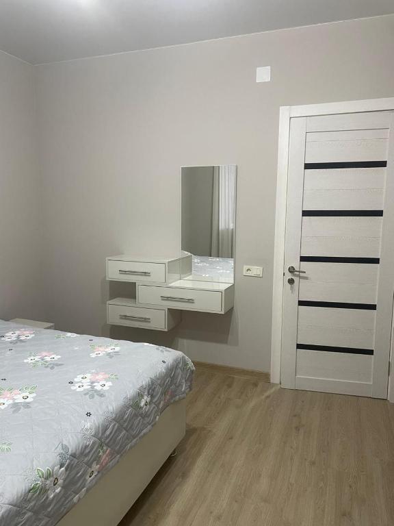 Postel nebo postele na pokoji v ubytování IR Guest House