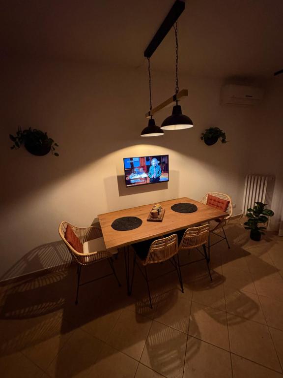 TV a/nebo společenská místnost v ubytování DImORA sALAmAC