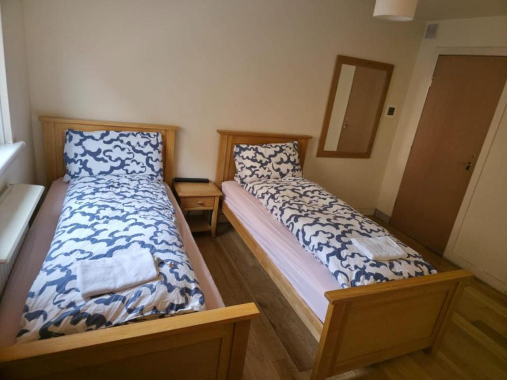 Postel nebo postele na pokoji v ubytování SummStay