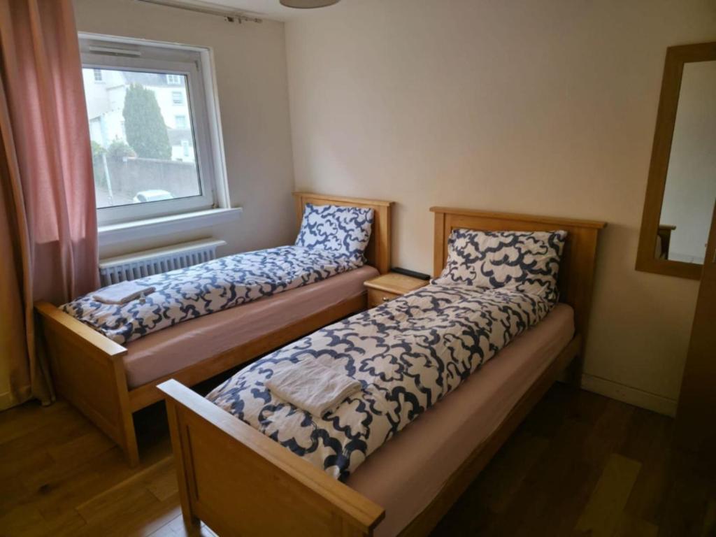 Postel nebo postele na pokoji v ubytování SummStay