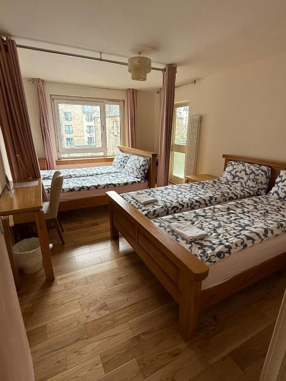 Postel nebo postele na pokoji v ubytování SummStay