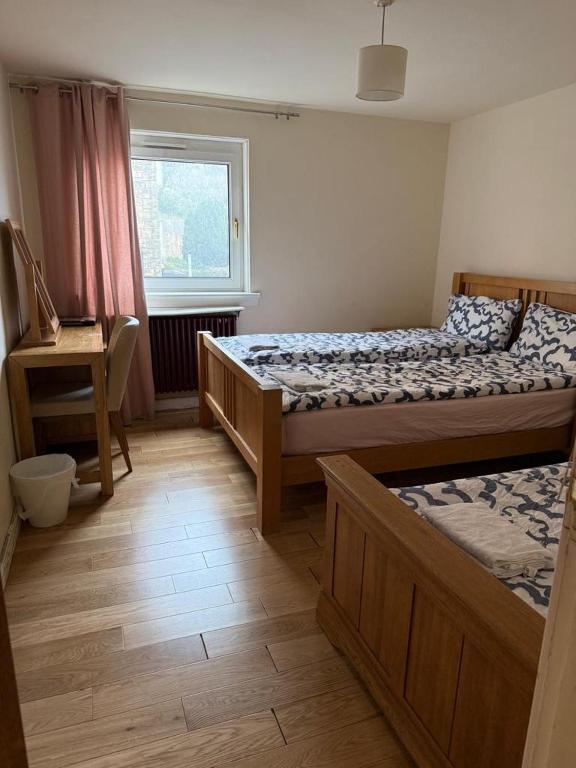 Postel nebo postele na pokoji v ubytování SummStay