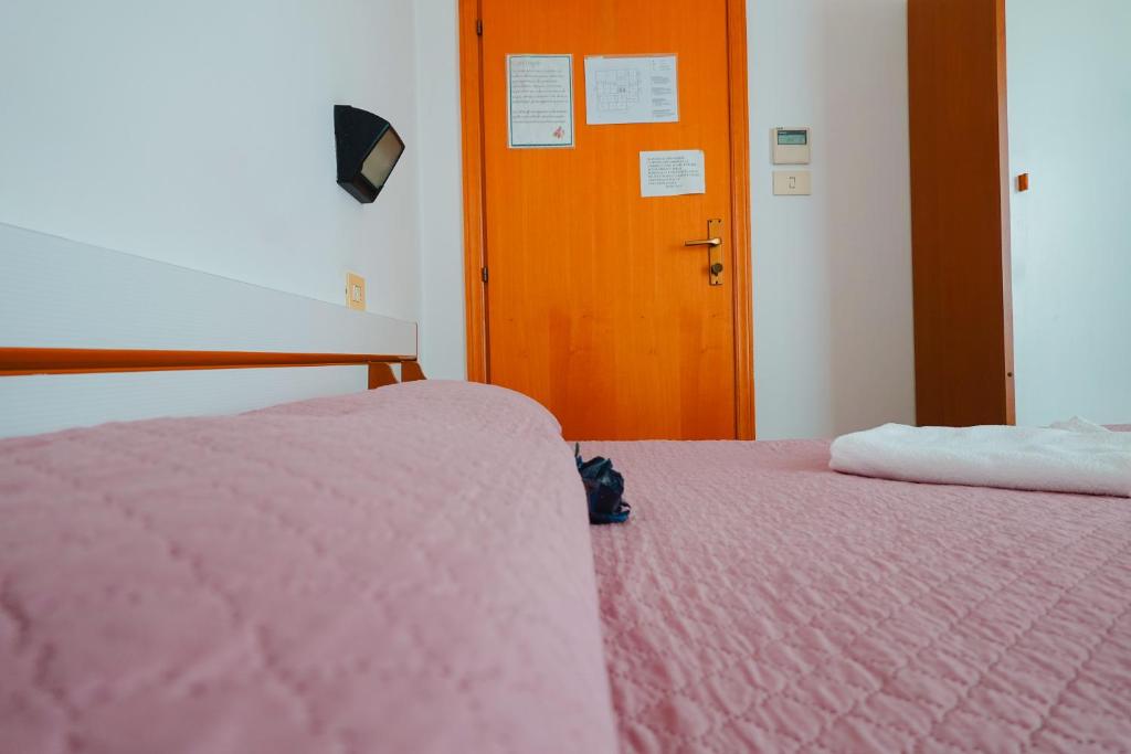 Postel nebo postele na pokoji v ubytování HOTEL LEA B&B Pensione Completa