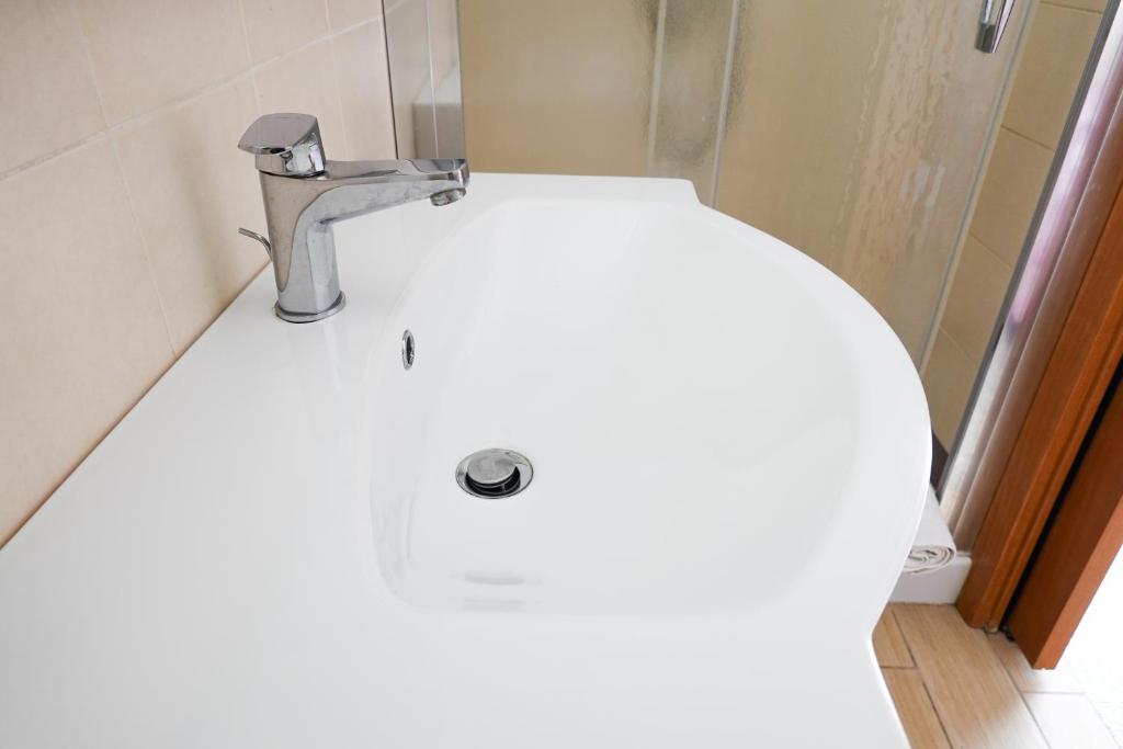 Koupelna v ubytování HOTEL LEA B&B Pensione Completa
