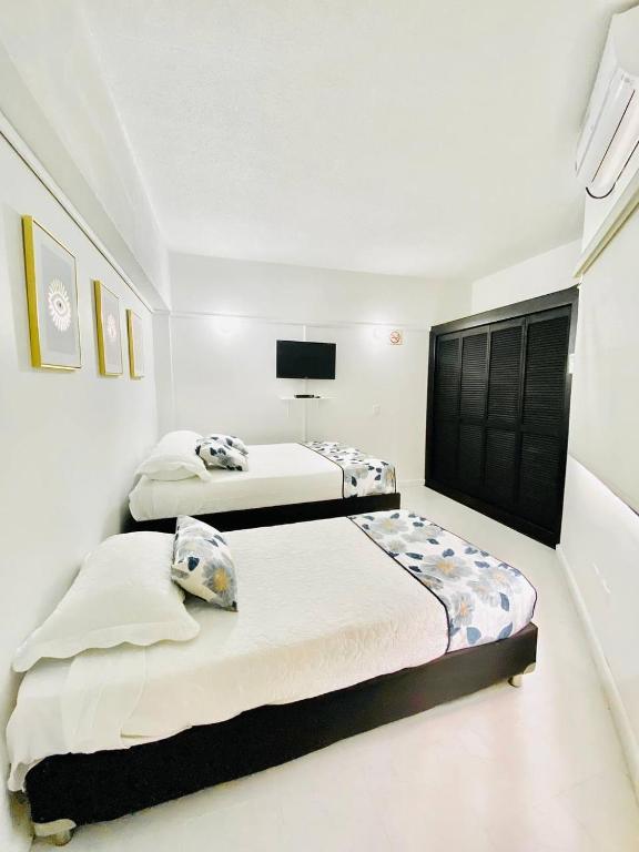 Postel nebo postele na pokoji v ubytování Alojamiento Casa-posada CAMELL
