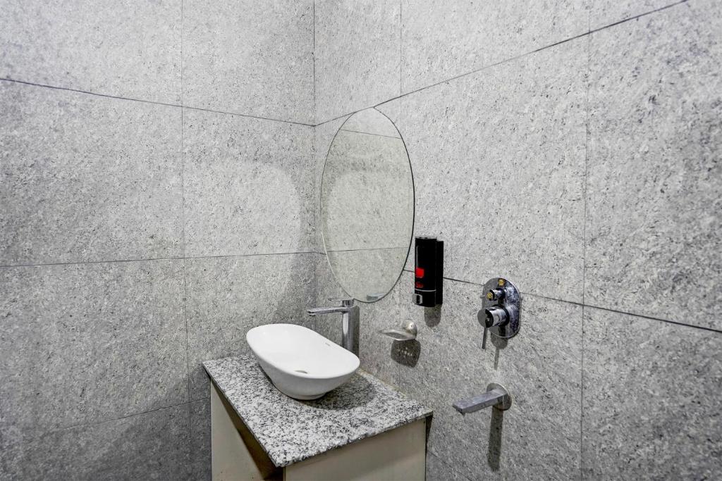 Koupelna v ubytování Super Hotel O Badrinath Road Tapovan