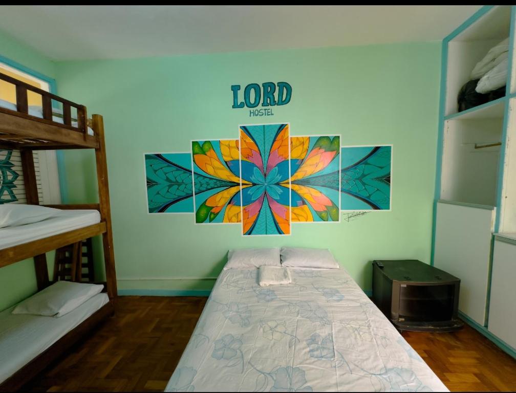 Postel nebo postele na pokoji v ubytování Lord Hostel