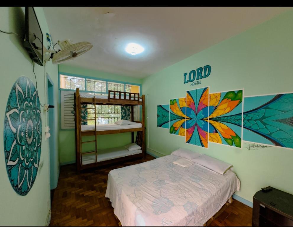 Postel nebo postele na pokoji v ubytování Lord Hostel