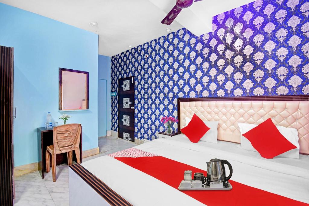 Postel nebo postele na pokoji v ubytování Hotel O Ankan Regency Near Acropolis Mall