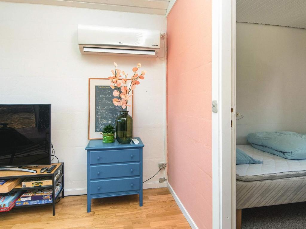 Postel nebo postele na pokoji v ubytování Holiday home Skals VI