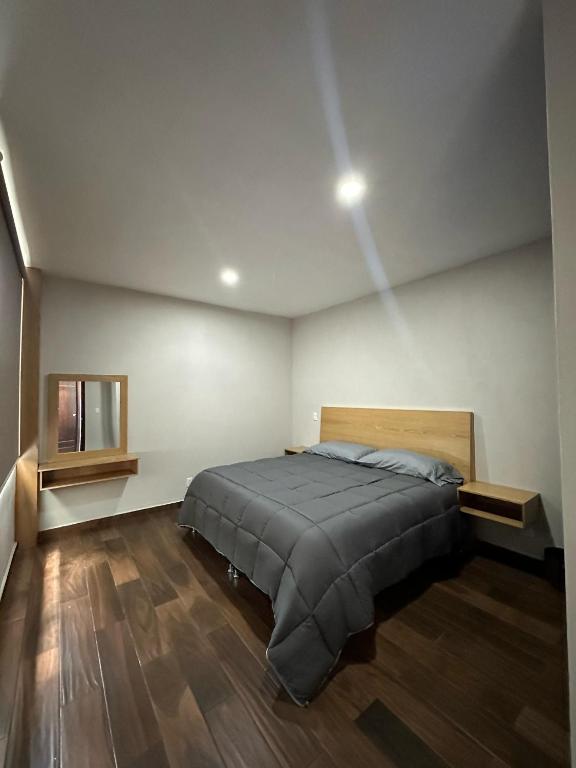 Postel nebo postele na pokoji v ubytování MR Hotel