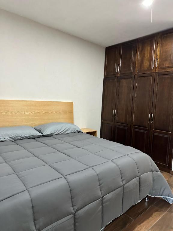 Postel nebo postele na pokoji v ubytování MR Hotel