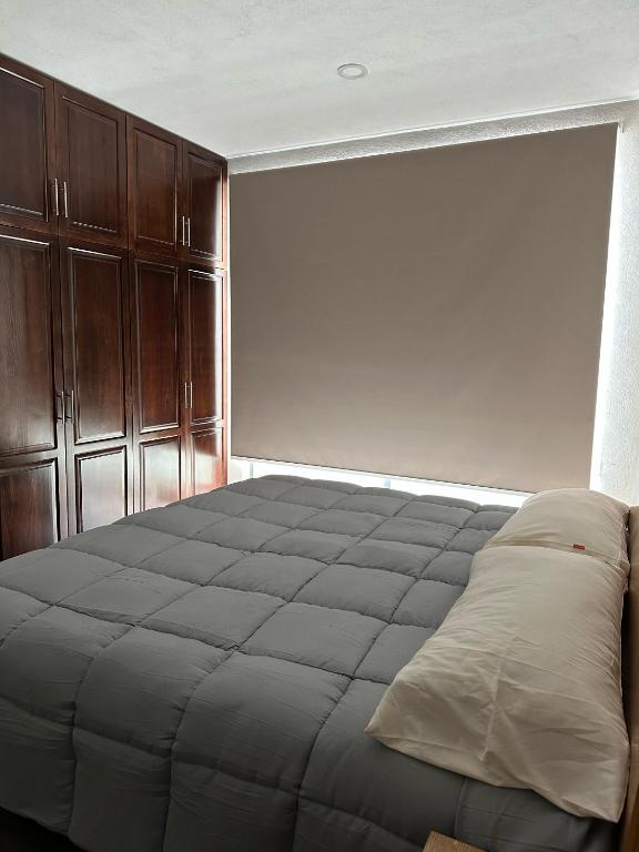 Postel nebo postele na pokoji v ubytování MR Hotel