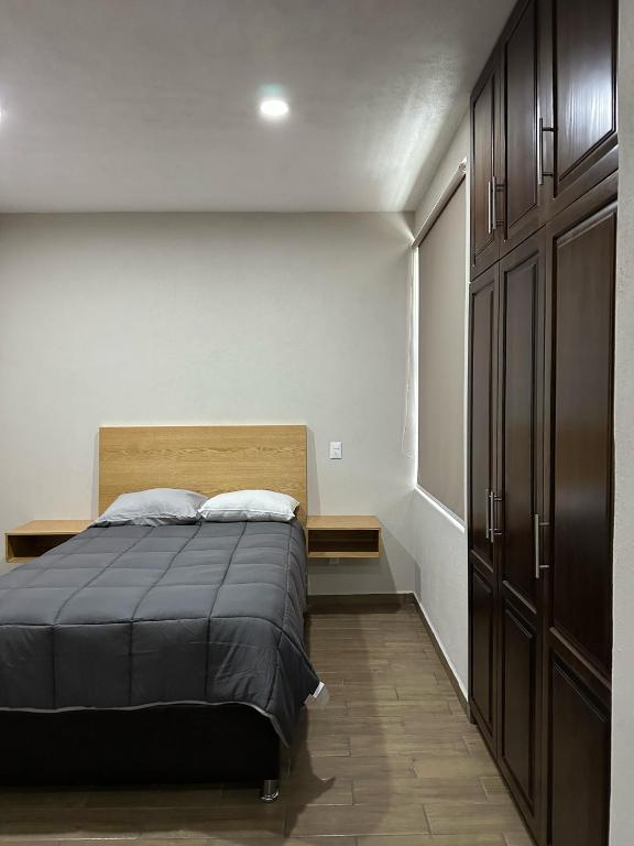Postel nebo postele na pokoji v ubytování MR Hotel