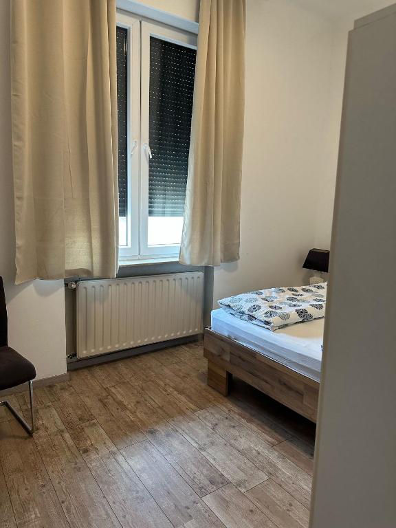 Postel nebo postele na pokoji v ubytování Hotel Gambrinus