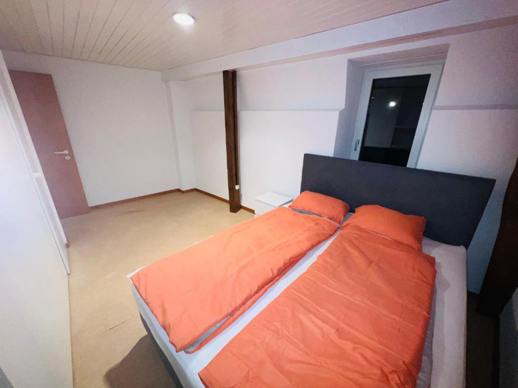 Postel nebo postele na pokoji v ubytování Haus Simplon