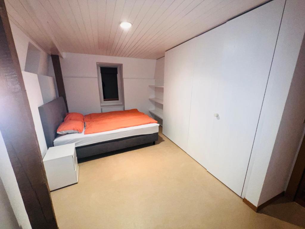 Postel nebo postele na pokoji v ubytování Haus Simplon
