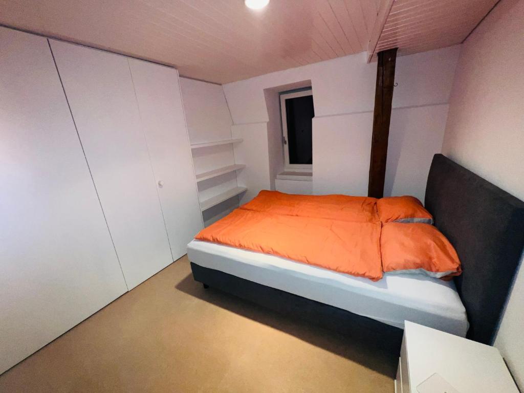 Postel nebo postele na pokoji v ubytování Haus Simplon