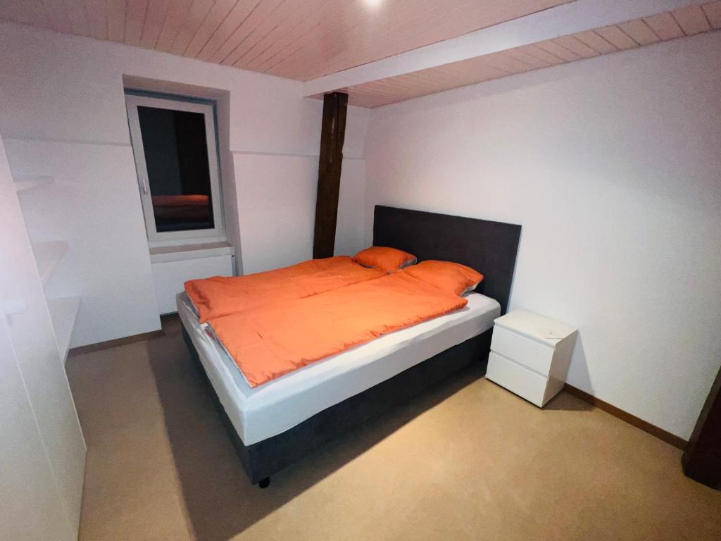 Postel nebo postele na pokoji v ubytování Haus Simplon