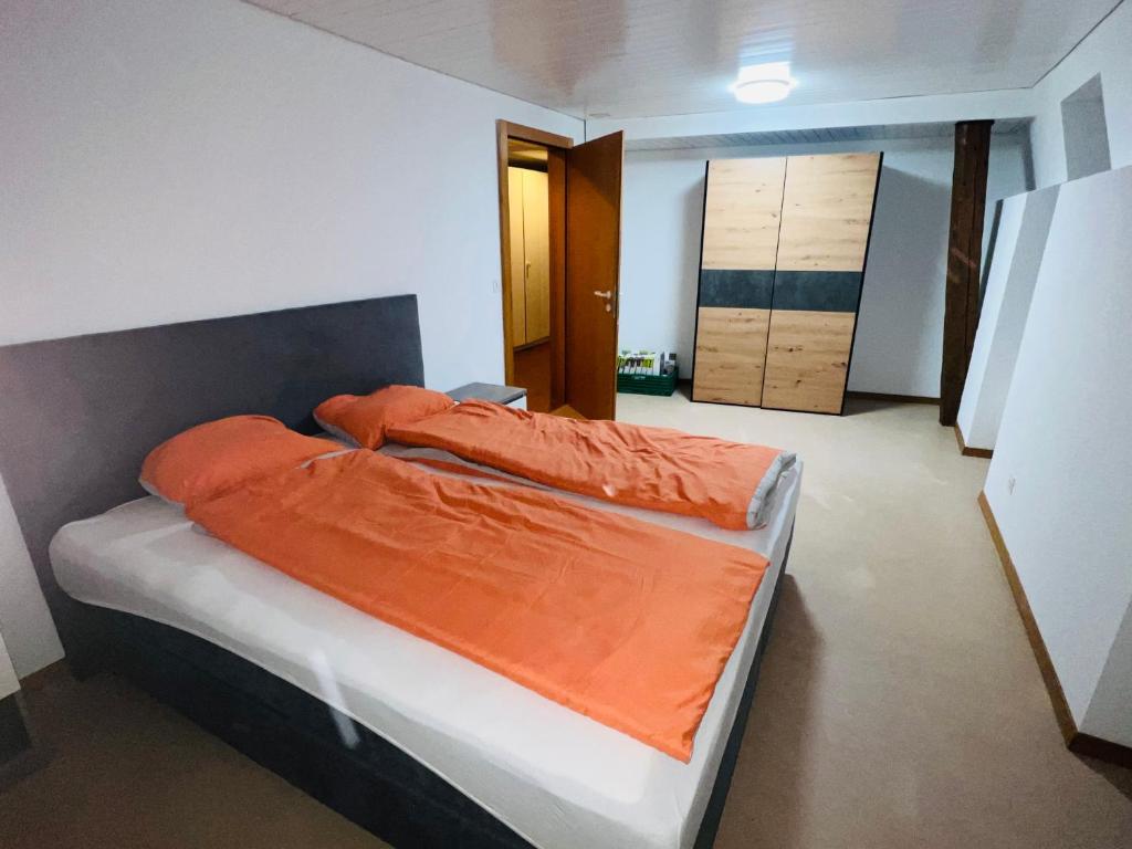 Postel nebo postele na pokoji v ubytování Haus Simplon