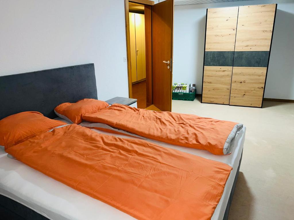 Postel nebo postele na pokoji v ubytování Haus Simplon