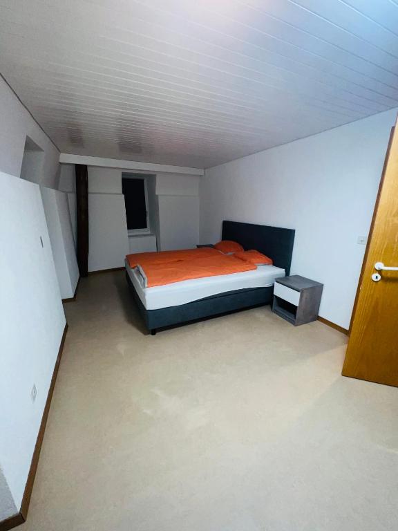 Postel nebo postele na pokoji v ubytování Haus Simplon