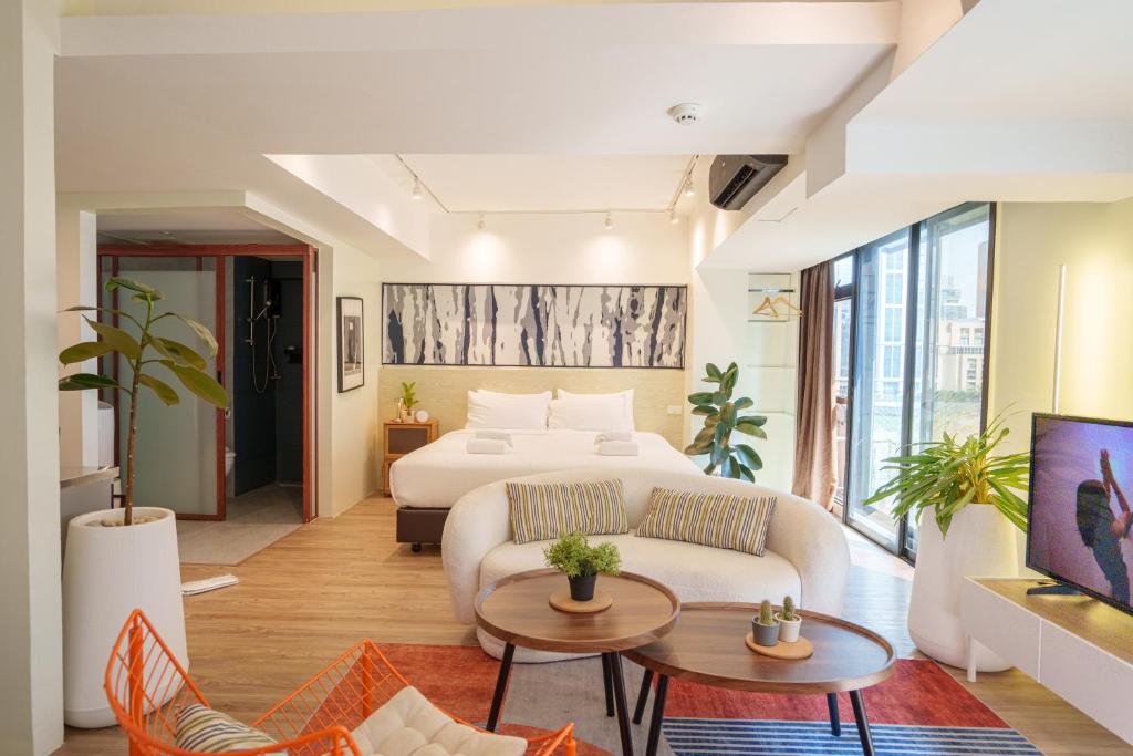 TV a/nebo společenská místnost v ubytování Gecko EYE Hotel