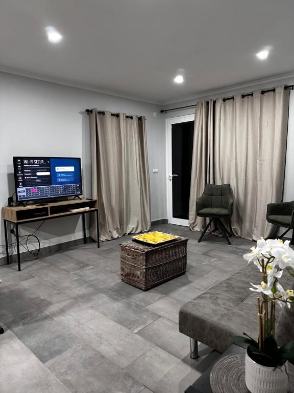 TV a/nebo společenská místnost v ubytování Casa do Facho