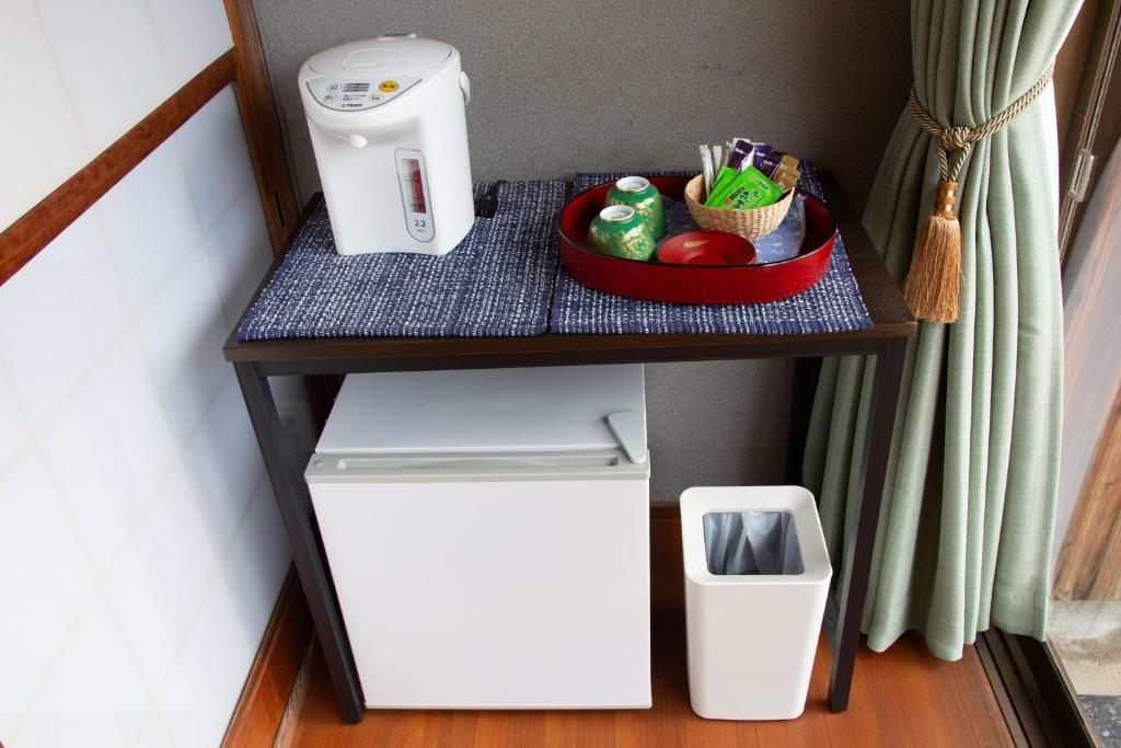 Kuchyň nebo kuchyňský kout v ubytování Guest Room Kanda