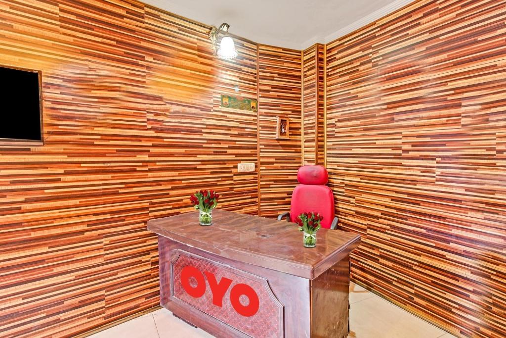 TV a/nebo společenská místnost v ubytování Hotel O Hunter's & Cafe