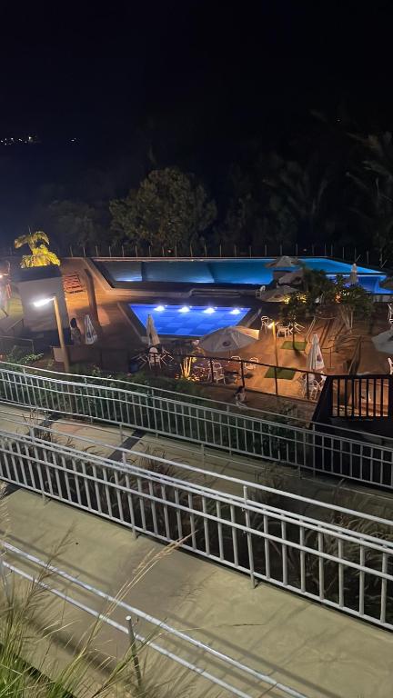 a train on the tracks at night at Descanso e lazer in Parnamirim