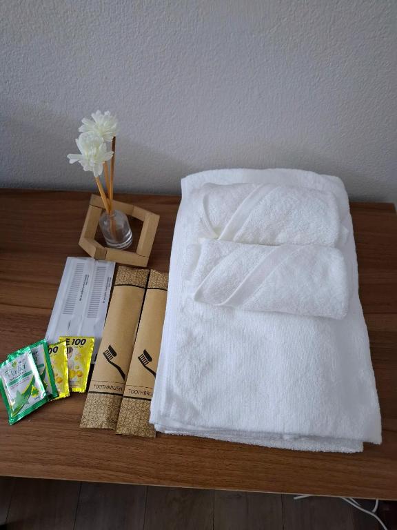 Postel nebo postele na pokoji v ubytování Airy Nest Hotel