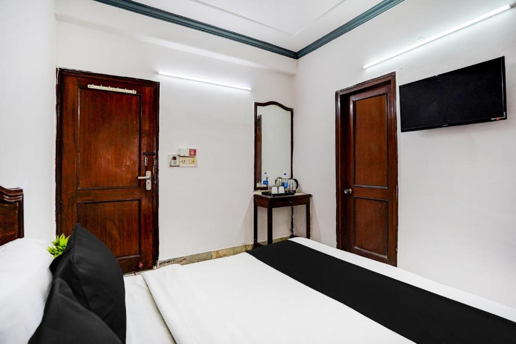 TV a/nebo společenská místnost v ubytování Hotel O Iconic Residency