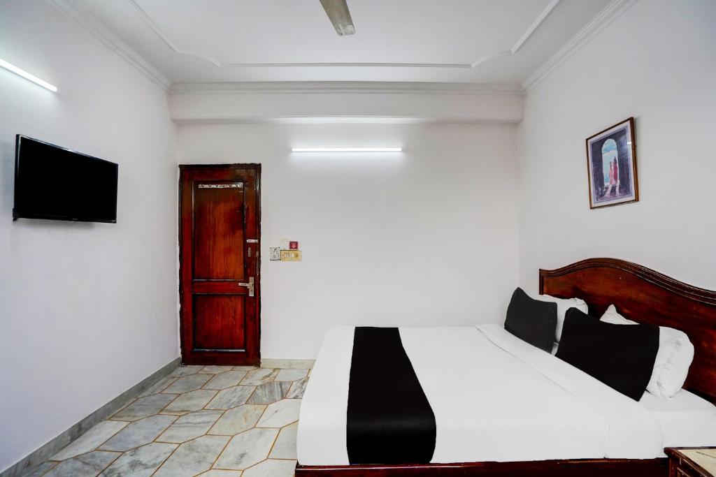 TV a/nebo společenská místnost v ubytování Hotel O Iconic Residency