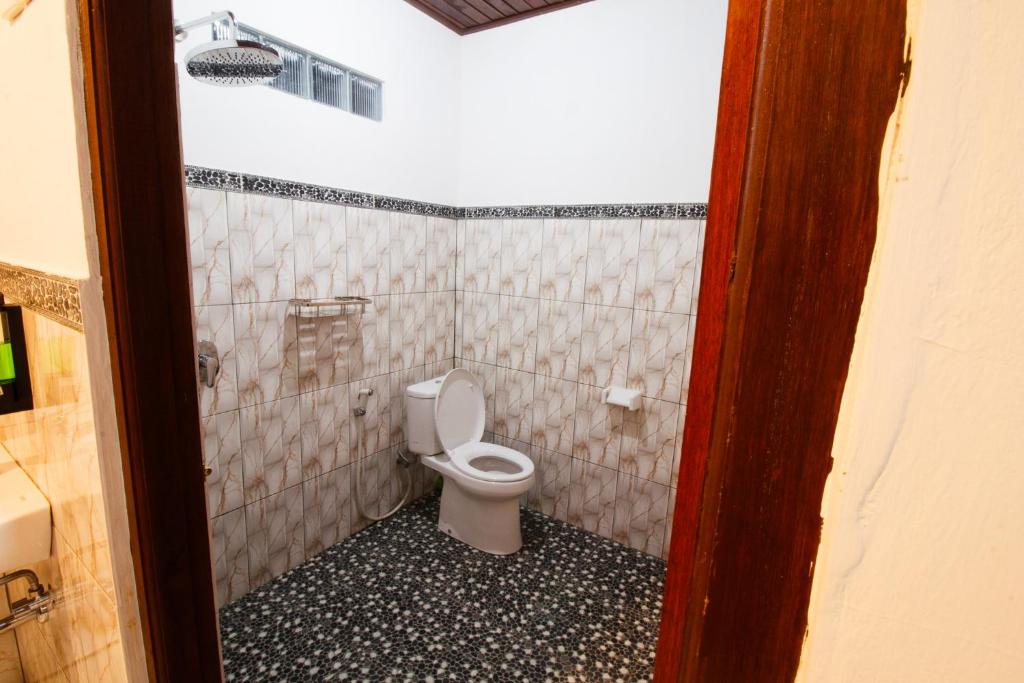 Koupelna v ubytování Timbul Homestay