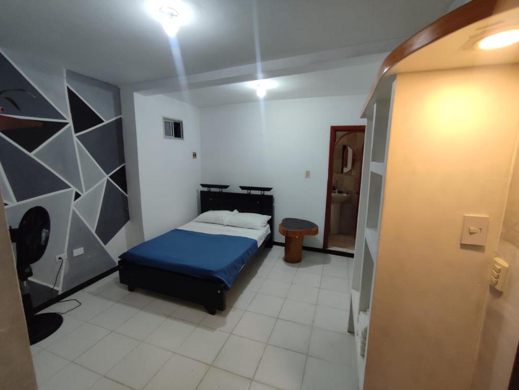 Postel nebo postele na pokoji v ubytování casa Huanuco hospedaje