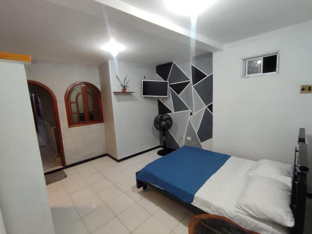 Postel nebo postele na pokoji v ubytování casa Huanuco hospedaje
