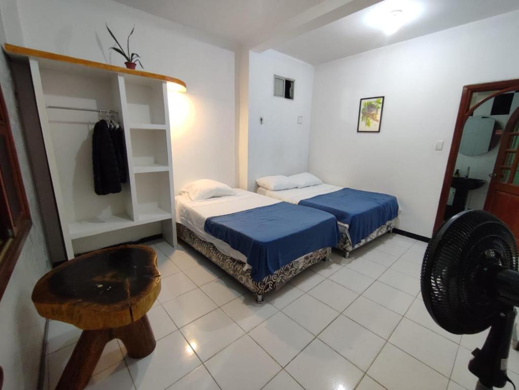 Postel nebo postele na pokoji v ubytování casa Huanuco hospedaje