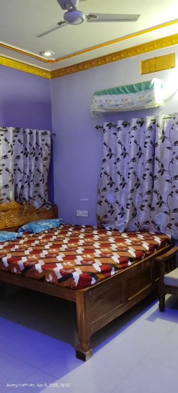 Postel nebo postele na pokoji v ubytování Om guest house