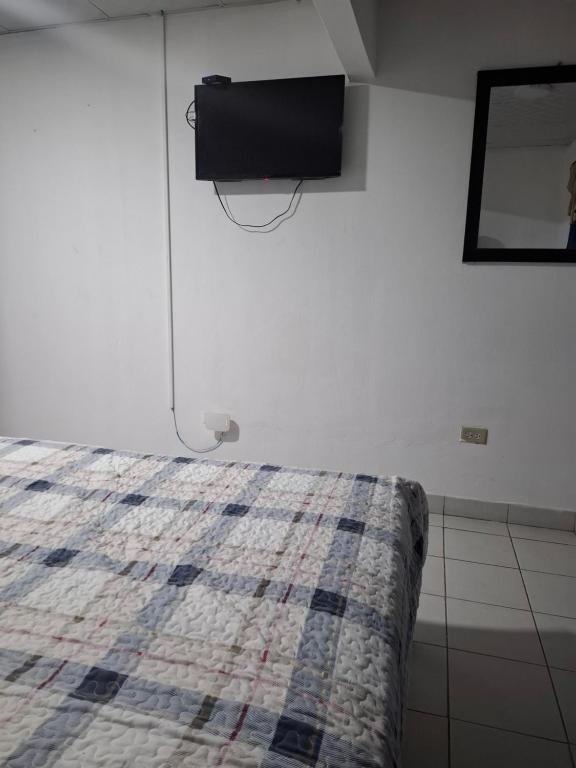 Postel nebo postele na pokoji v ubytování Casa Margarita