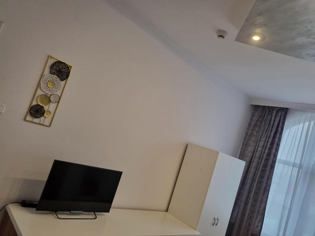 TV a/nebo společenská místnost v ubytování Unilux