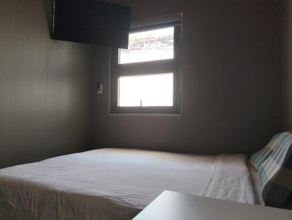 Postel nebo postele na pokoji v ubytování Đồi Sao Homestay