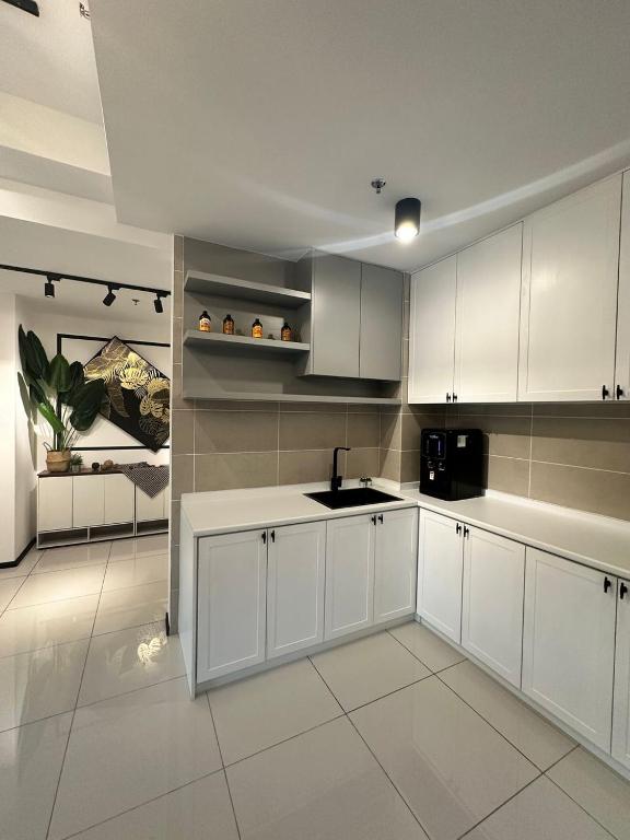 Kuchyň nebo kuchyňský kout v ubytování Sunway Onsen Suites