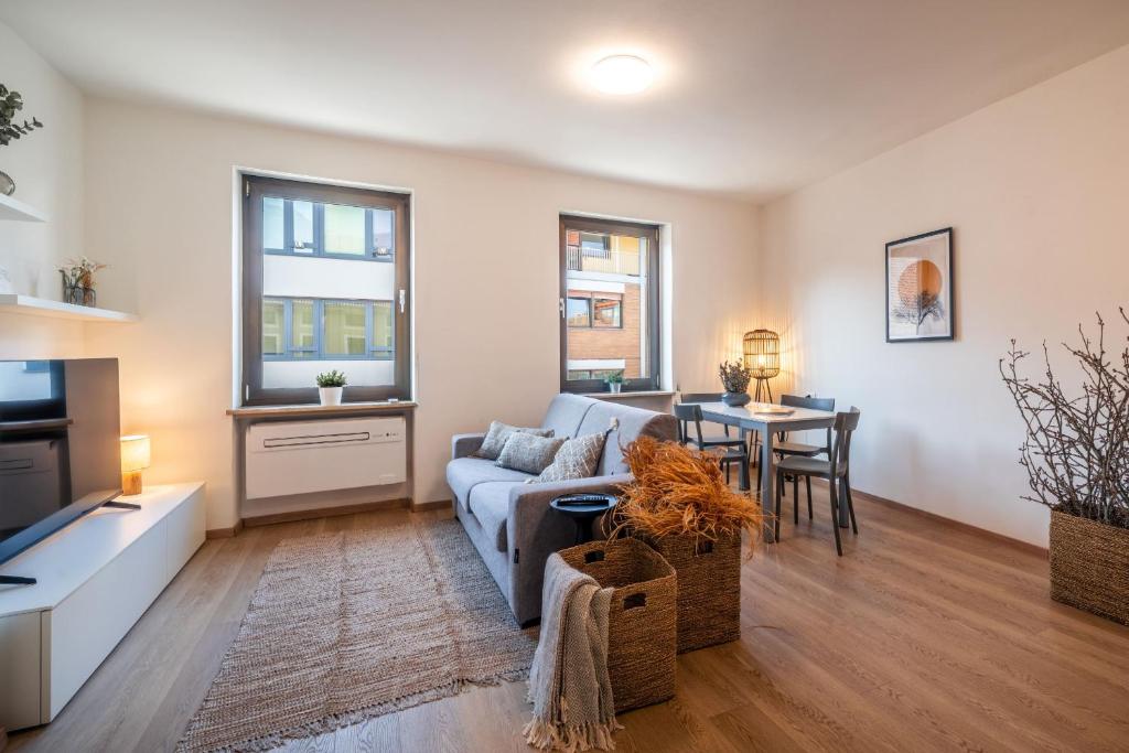 TV a/nebo společenská místnost v ubytování Aurora - The City Center Apartment