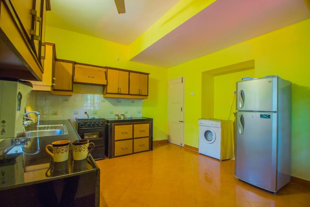 Kuchyň nebo kuchyňský kout v ubytování Hotel O Keegan Palms bhk