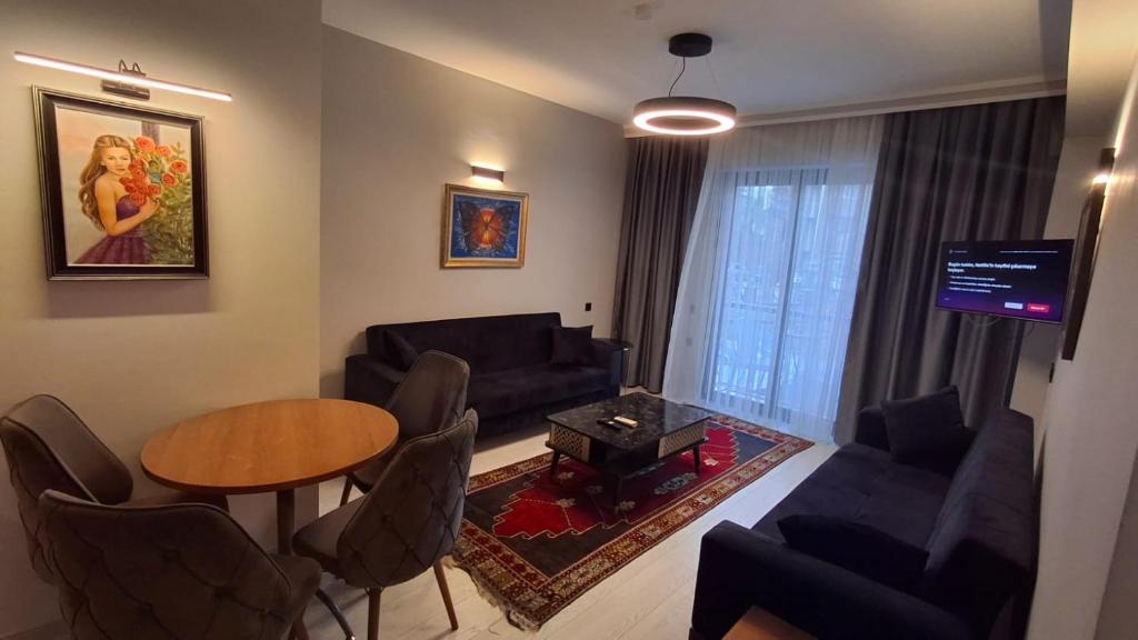 TV a/nebo společenská místnost v ubytování Orange Garden Aparts & Hotel THE NORDIC